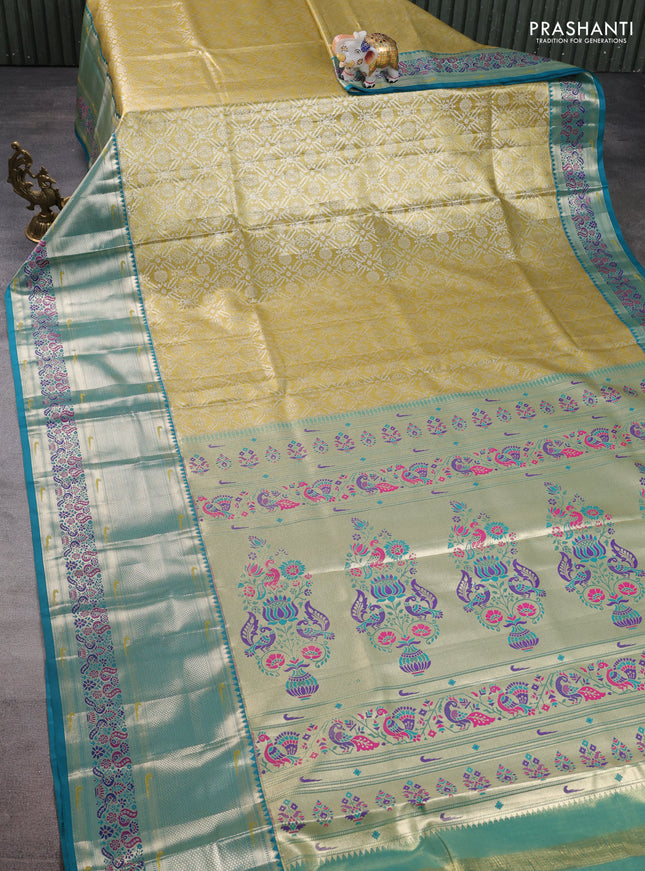 Tissue paithani silk saree mustard yellow and teal green with allover silver zari woven brocade weaves and long zari woven paithani style border