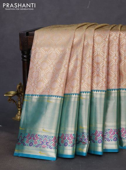 Tissue paithani silk saree dual shade of sandal and teal green with allover silver zari woven brocade weaves and long zari woven paithani style border