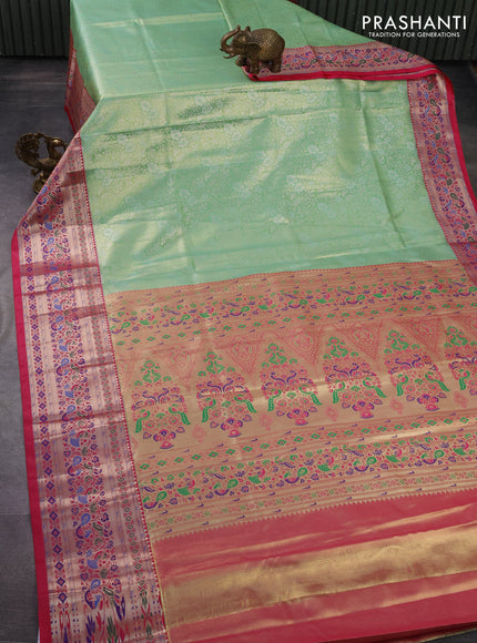 Tissue paithani silk saree light green and pink with allover silver zari woven brocade weaves and zari woven paithani style border