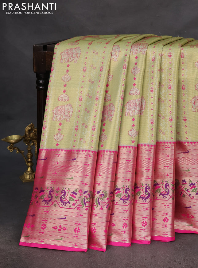 Tissue paithani silk saree pista green and pink with allover zari woven brocade weaves and long zari woven paithani style border