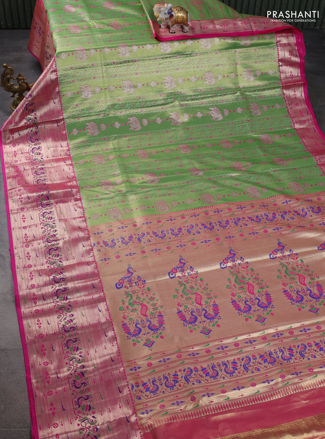 Tissue paithani silk saree light green and pink with allover zari woven brocade weaves and long zari woven paithani style border
