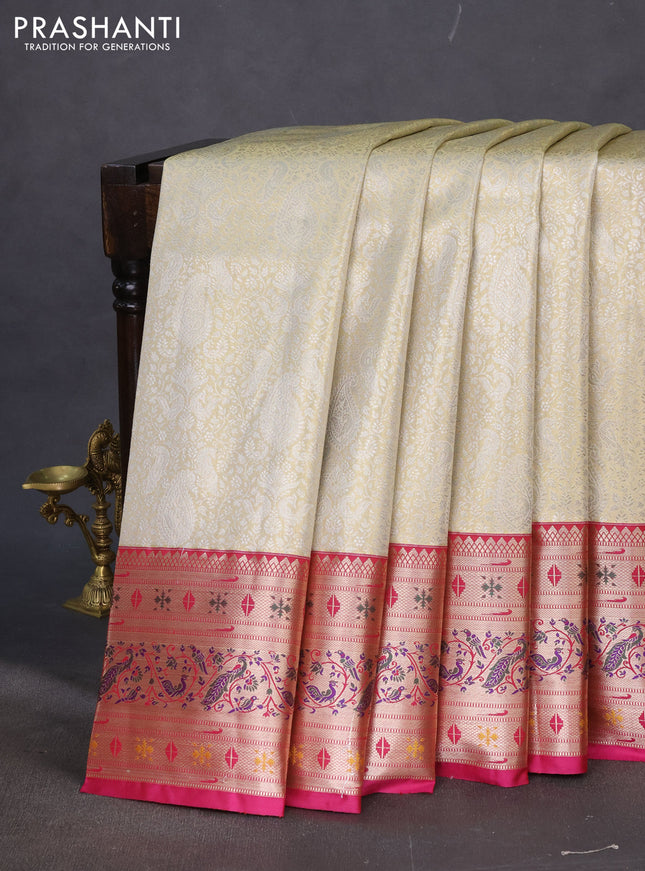 Tissue paithani silk saree cream and magenta pink with allover zari woven brocade weaves and long zari woven paithani style border