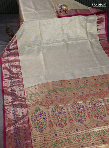 Tissue paithani silk saree cream and magenta pink with allover zari woven brocade weaves and long zari woven paithani style border