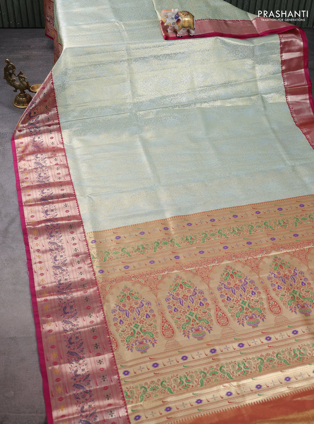 Tissue paithani silk saree pastel green and magenta pink with allover silver zari woven brocade weaves and zari woven paithani style border