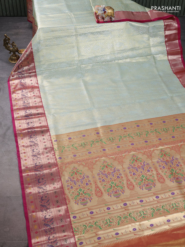 Tissue paithani silk saree pastel green and magenta pink with allover silver zari woven brocade weaves and zari woven paithani style border