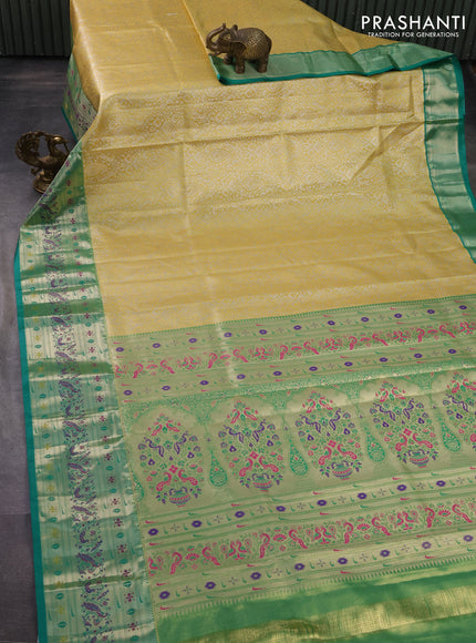 Tissue paithani silk saree yellow and teal green with allover silver zari woven brocade weaves and zari woven paithani style border