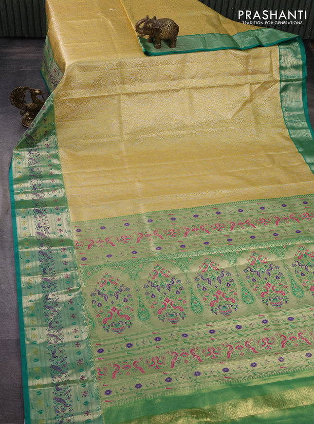 Tissue paithani silk saree yellow and teal green with allover silver zari woven brocade weaves and zari woven paithani style border