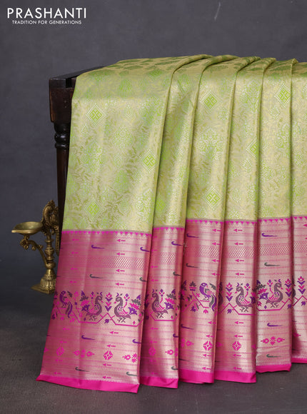 Tissue paithani silk saree light green and magenta pink with allover zari woven brocade weaves and long zari woven paithani style border