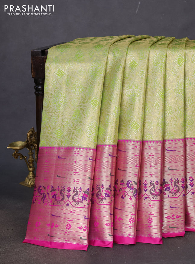 Tissue paithani silk saree light green and magenta pink with allover zari woven brocade weaves and long zari woven paithani style border