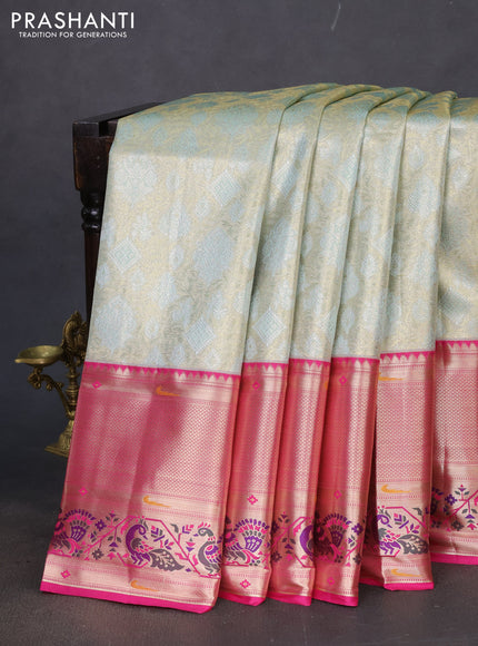 Tissue paithani silk saree pastel shade and pink with allover zari woven brocade weaves and long zari woven paithani style border