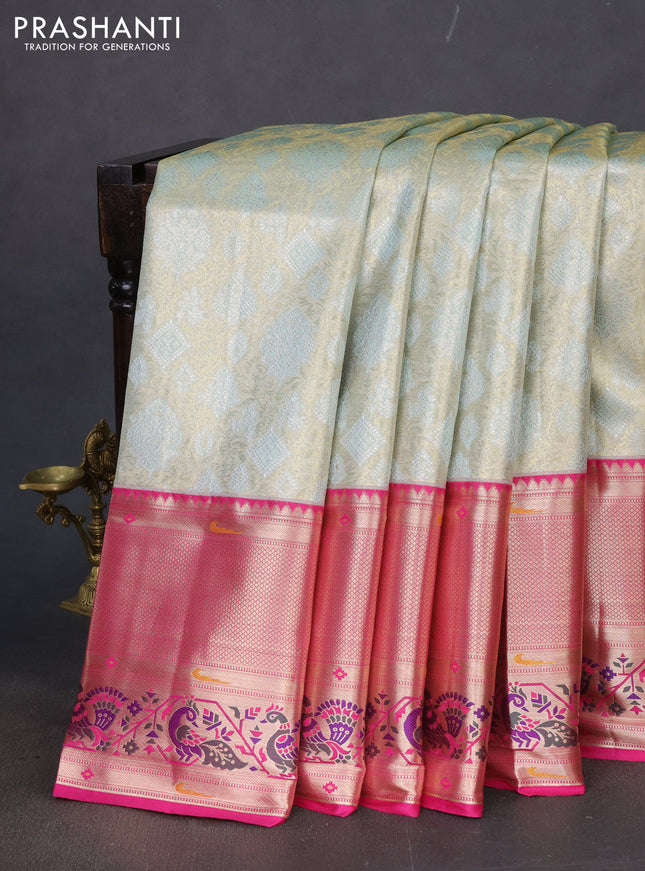 Tissue paithani silk saree pastel shade and pink with allover zari woven brocade weaves and long zari woven paithani style border