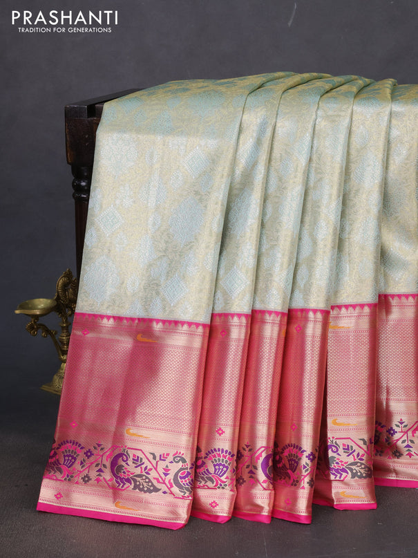 Tissue paithani silk saree pastel shade and pink with allover zari woven brocade weaves and long zari woven paithani style border