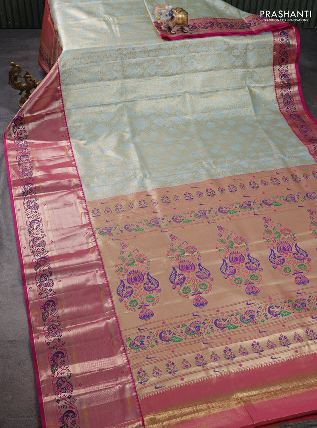 Tissue paithani silk saree pastel shade and pink with allover zari woven brocade weaves and long zari woven paithani style border