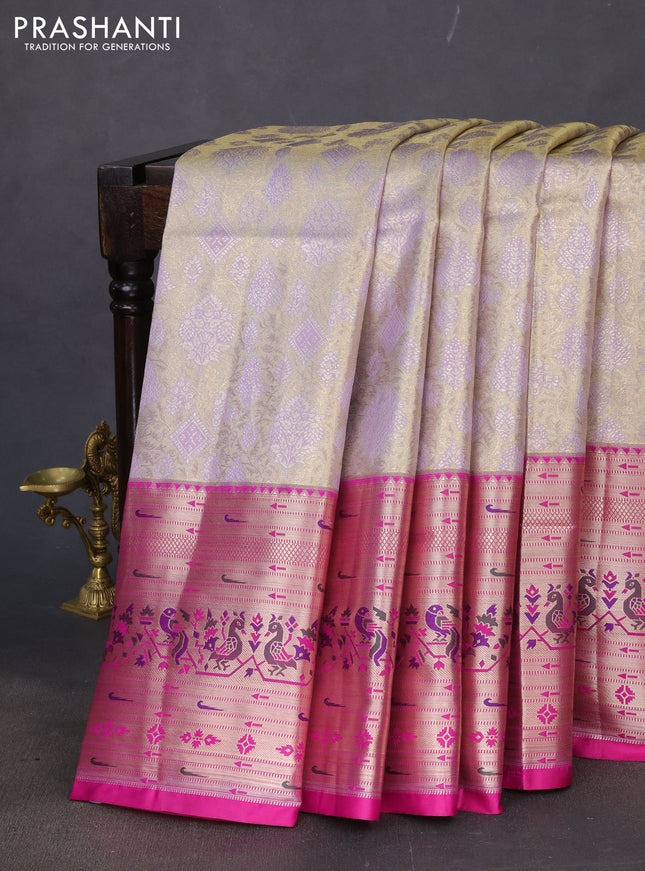 Tissue paithani silk saree pastel lavender and magenta pink with allover zari woven brocade weaves and long zari woven paithani style border