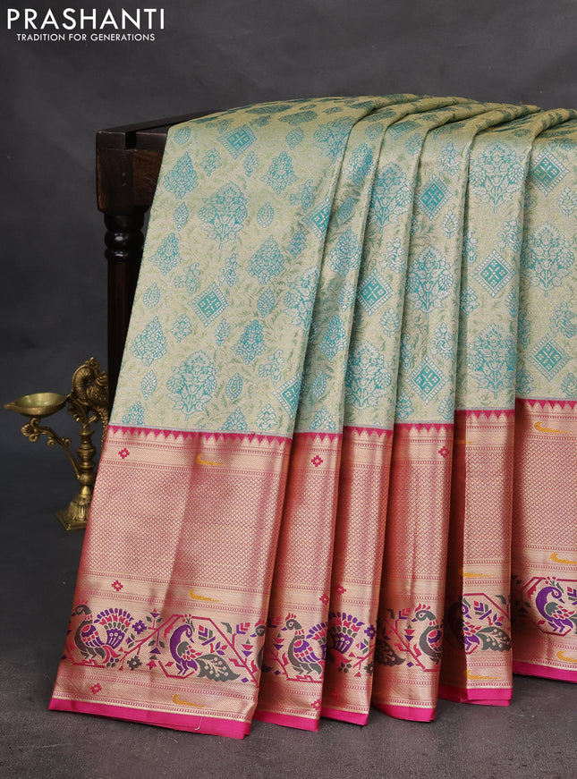 Tissue paithani silk saree dual shade of green and magenta pink with allover zari woven brocade weaves and long zari woven paithani style border