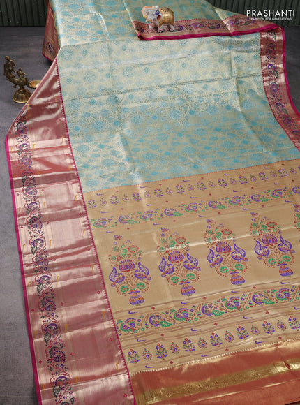 Tissue paithani silk saree dual shade of green and magenta pink with allover zari woven brocade weaves and long zari woven paithani style border