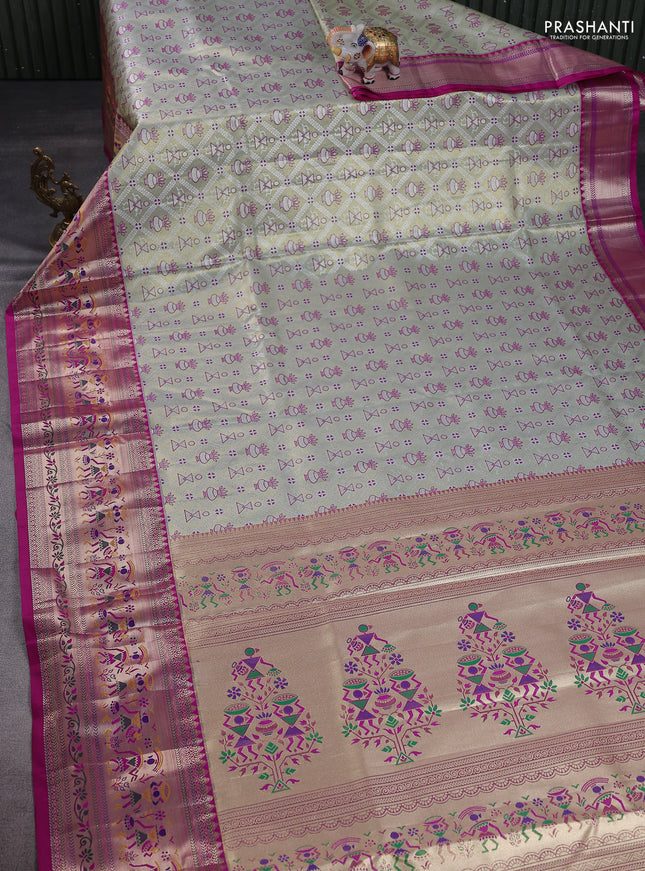 Tissue paithani silk saree pastel green and purple with allover zari woven brocade weaves and long zari woven paithani style border