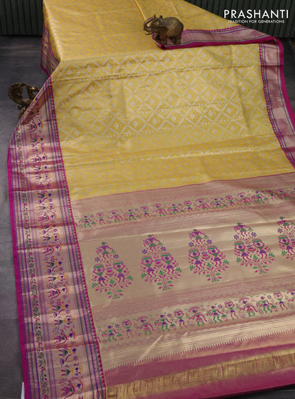 Tissue paithani silk saree yellow and magenta pink with allover silver zari woven brocade weaves and long zari woven paithani style border