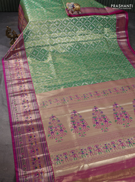 Tissue paithani silk saree green and magenta pink with allover silver zari woven brocade weaves and long zari woven paithani style border