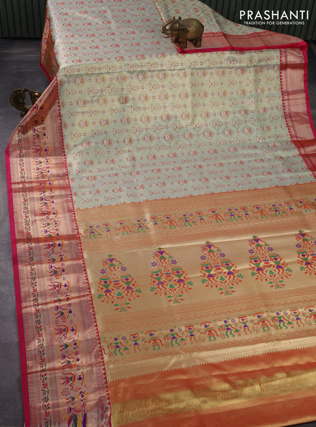 Tissue paithani silk saree pastel green and pink with allover silver zari woven brocade weaves and long zari woven paithani style border