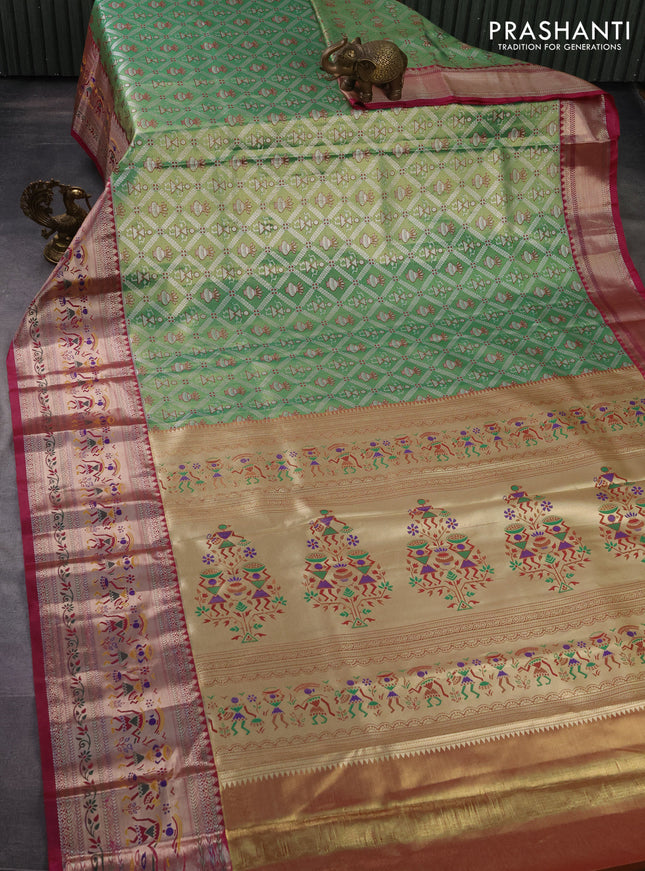 Tissue paithani silk saree green and dark magenta pink with allover silver zari woven brocade weaves and long zari woven paithani style border