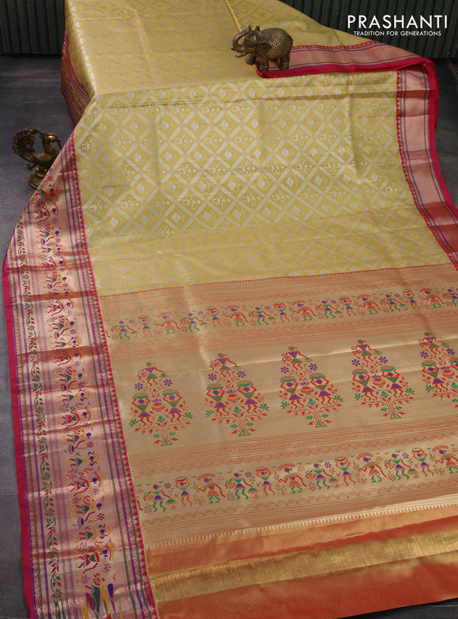 Tissue paithani silk saree yellow and pink with allover silver zari woven brocade weaves and long zari woven paithani style border