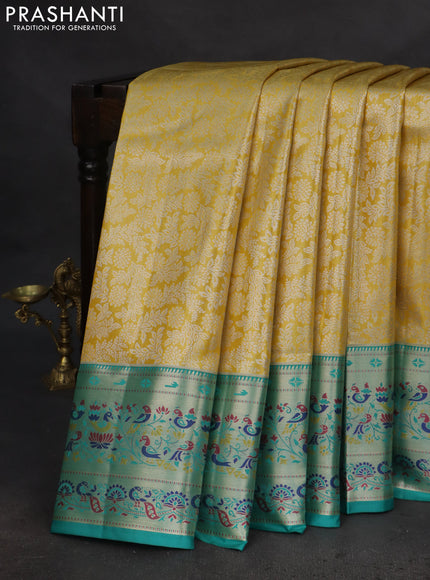 Tissue paithani silk saree yellow and teal blue with allover silver zari woven brocade weaves and zari woven paithani style border