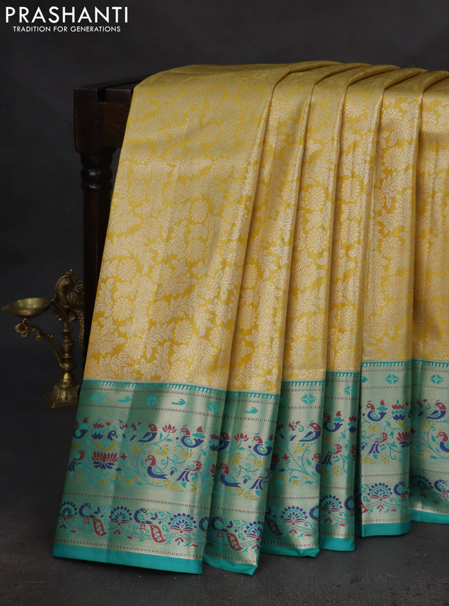 Tissue paithani silk saree yellow and teal blue with allover silver zari woven brocade weaves and zari woven paithani style border