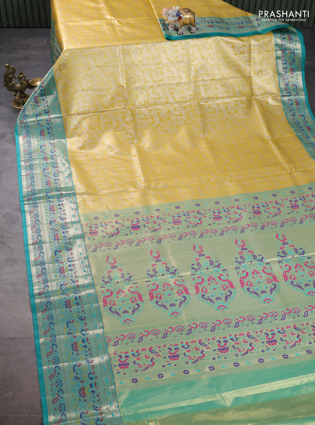 Tissue paithani silk saree yellow and teal blue with allover silver zari woven brocade weaves and zari woven paithani style border