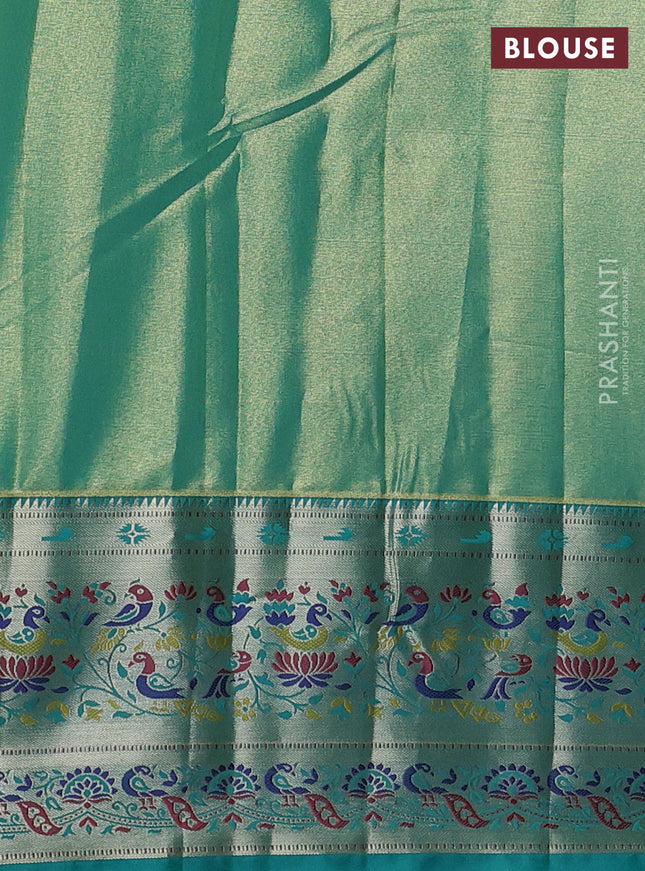 Tissue paithani silk saree dual shade of pale orange and teal blue with allover silver zari woven brocade weaves and zari woven paithani style border