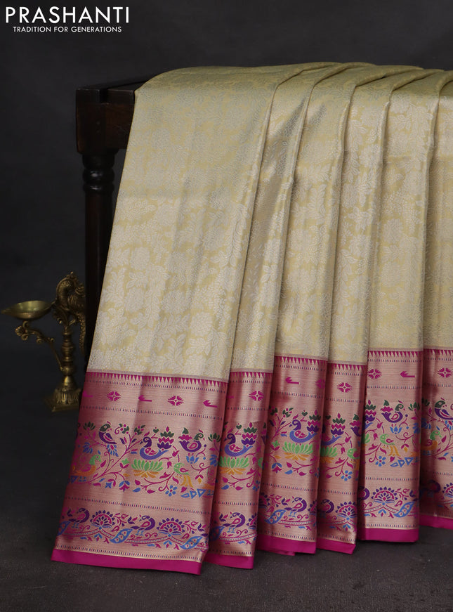 Tissue paithani silk saree cream and purple with allover silver zari woven brocade weaves and zari woven paithani style border