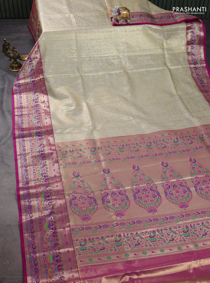 Tissue paithani silk saree cream and purple with allover silver zari woven brocade weaves and zari woven paithani style border