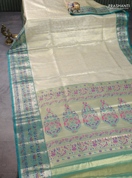 Tissue paithani silk saree cream and teal green with allover silver zari woven brocade weaves and zari woven paithani style border