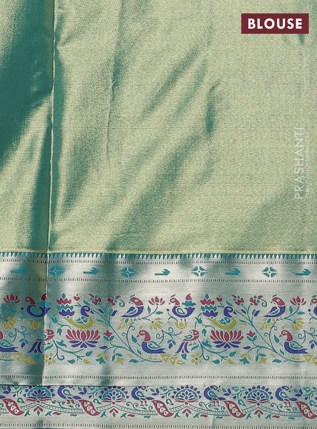 Tissue paithani silk saree cream and teal green with allover silver zari woven brocade weaves and zari woven paithani style border