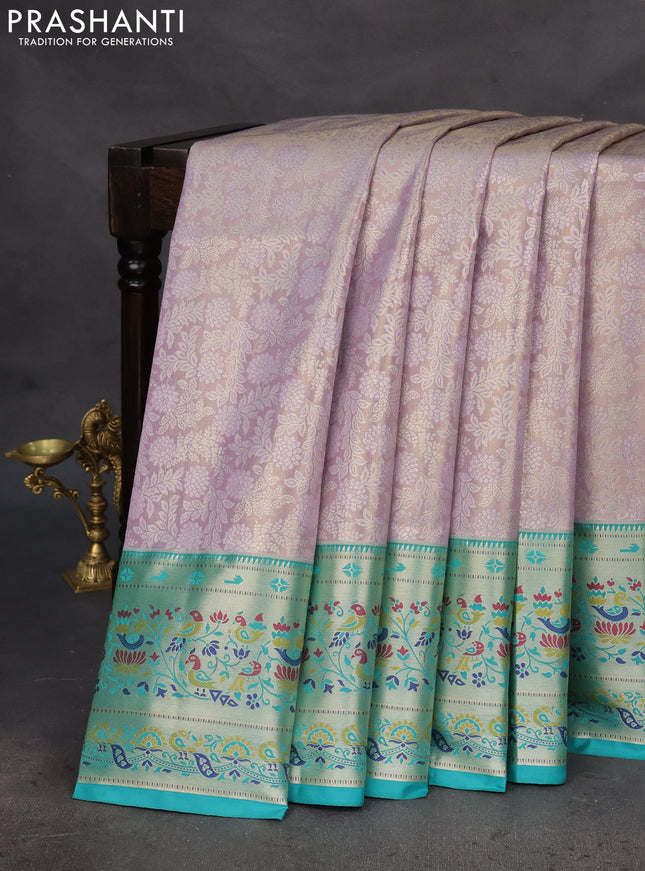 Tissue paithani silk saree lavender and teal green with allover silver zari woven brocade weaves and zari woven paithani style border