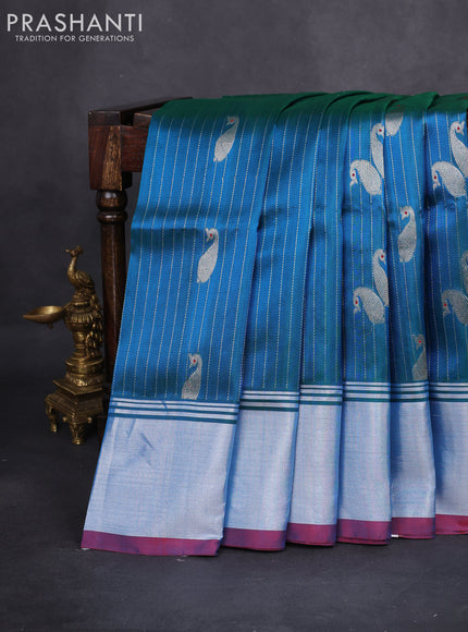 Venkatagiri silk saree dual shade of teal bluish green and red with allover silver zari woven paisley buttas and silver zari woven border