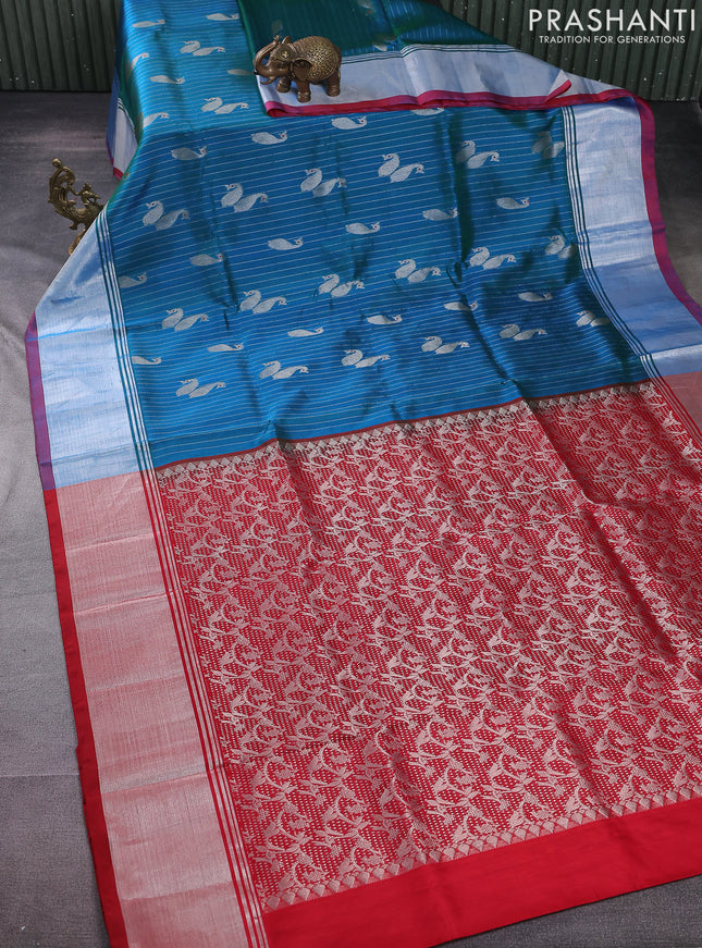 Venkatagiri silk saree dual shade of teal bluish green and red with allover silver zari woven paisley buttas and silver zari woven border