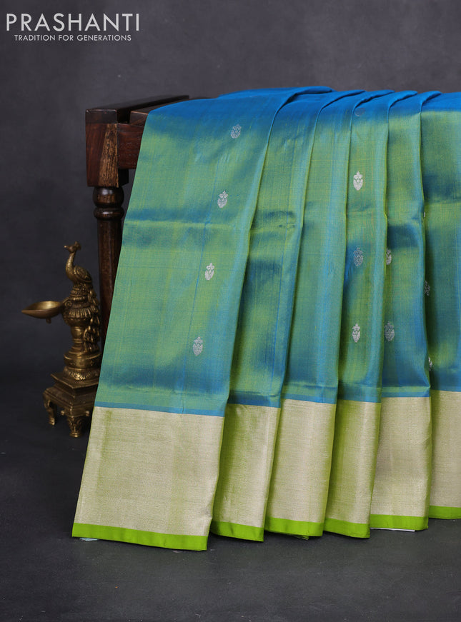 Venkatagiri silk saree dual shade of teal blue and light green with silver zari woven buttas and zari woven border