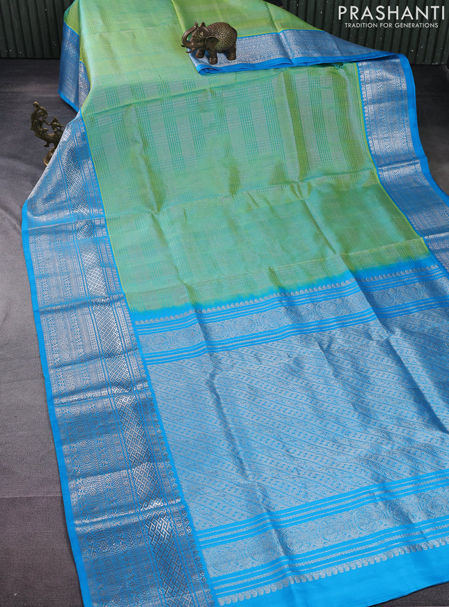 Venkatagiri silk saree teal green and cs blue with allover silver zari checked pattern and silver zari woven border