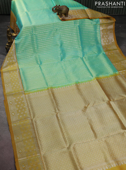 Venkatagiri silk saree teal green and mustard shade with allover silver zari weaves and silver zari woven border