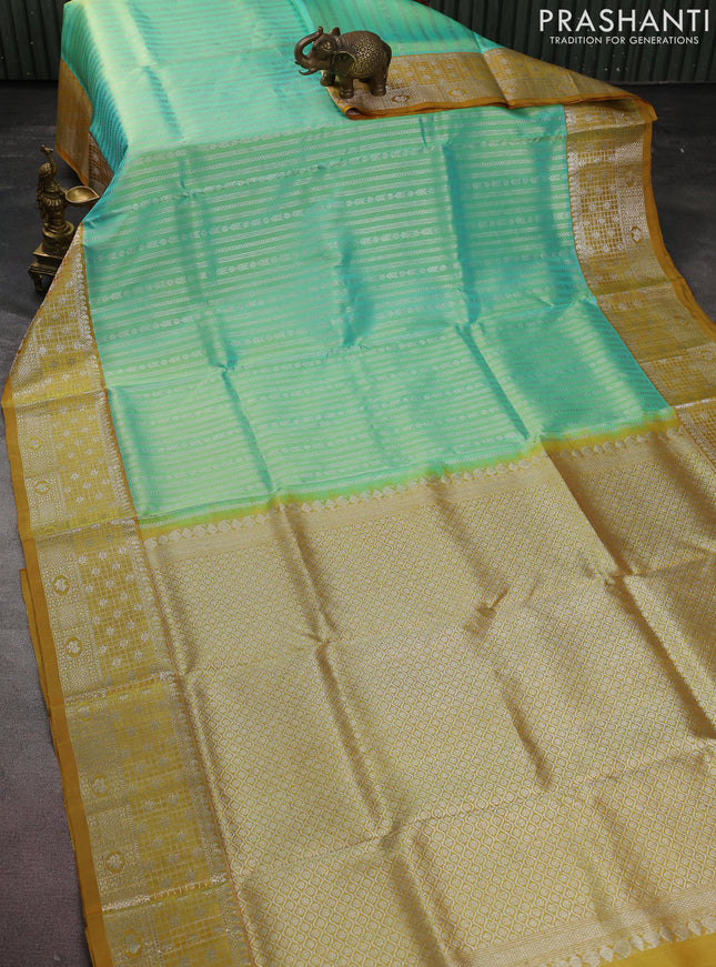 Venkatagiri silk saree teal green and mustard shade with allover silver zari weaves and silver zari woven border