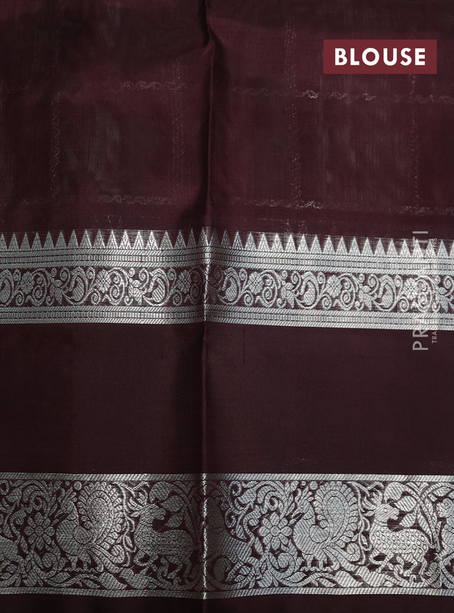 Venkatagiri silk saree pastel green and deep coffee brown with allover silver zari checks & buttas and silver zari woven butta border
