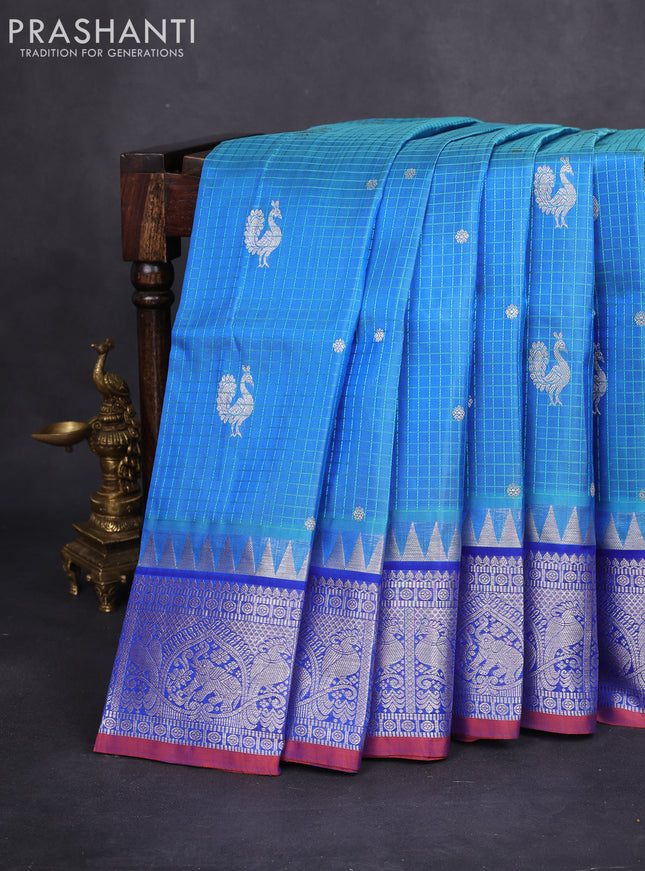 Venkatagiri silk saree teal blue and blue with allover thread checks & silver zari buttas and temple design silver zari woven border