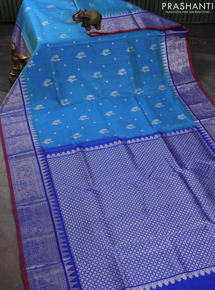 Venkatagiri silk saree teal blue and blue with allover thread checks & silver zari buttas and temple design silver zari woven border