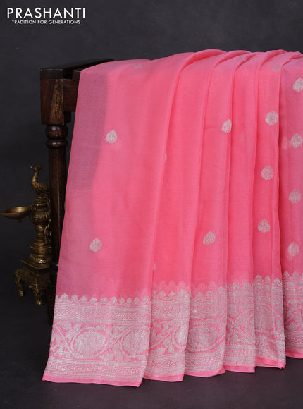 Banarasi chiffon silk saree peach pink with silver zari woven buttas and silver zari woven border