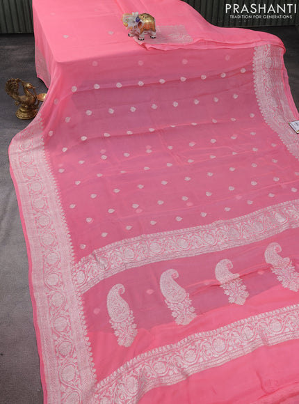Banarasi chiffon silk saree peach pink with silver zari woven buttas and silver zari woven border