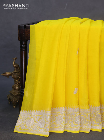 Banarasi chiffon silk saree yellow with silver zari woven buttas and silver zari woven border