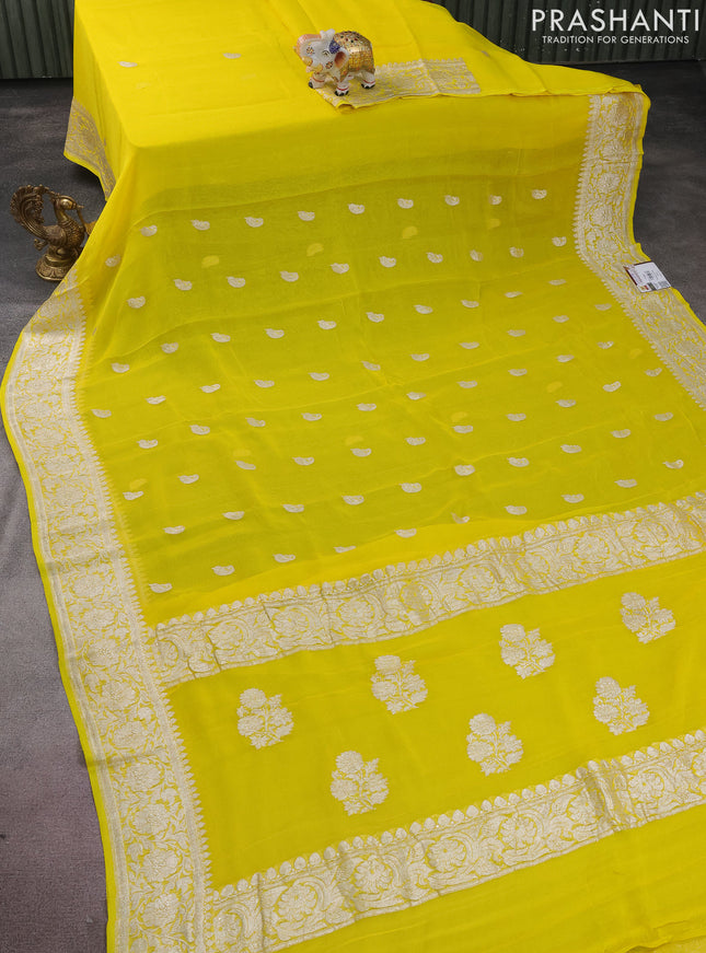 Banarasi chiffon silk saree yellow with silver zari woven buttas and silver zari woven border