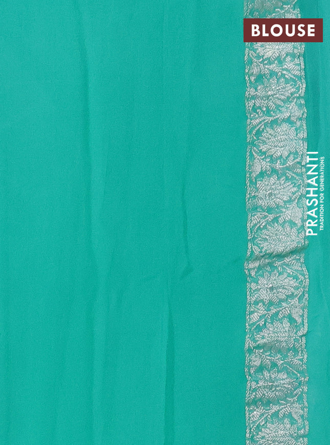 Banarasi chiffon silk saree teal green shade with silver zari woven buttas and silver zari woven border