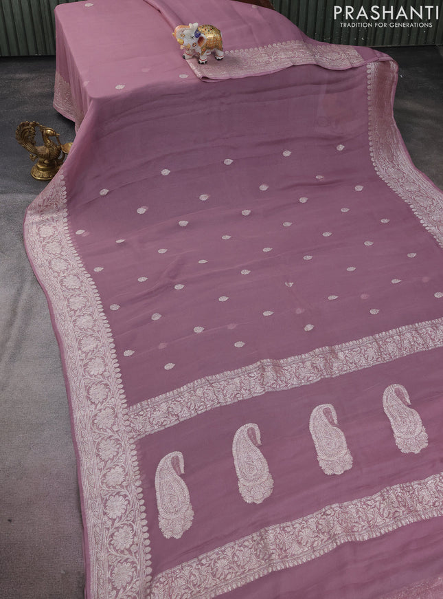 Banarasi chiffon silk saree pastel pink with silver zari woven buttas and silver zari woven border